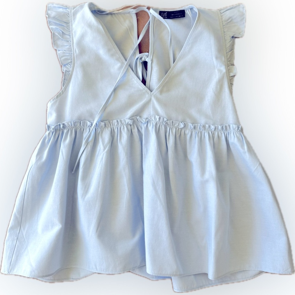 Blue flowy sleeveless top